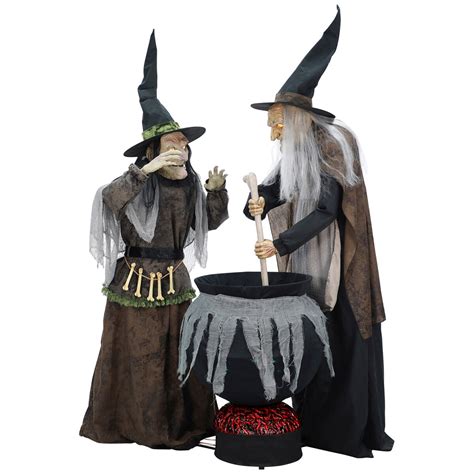 Animatromic witch with cauldron